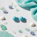 Sky Blue Double Ball Earrings Coastal Flat Lay